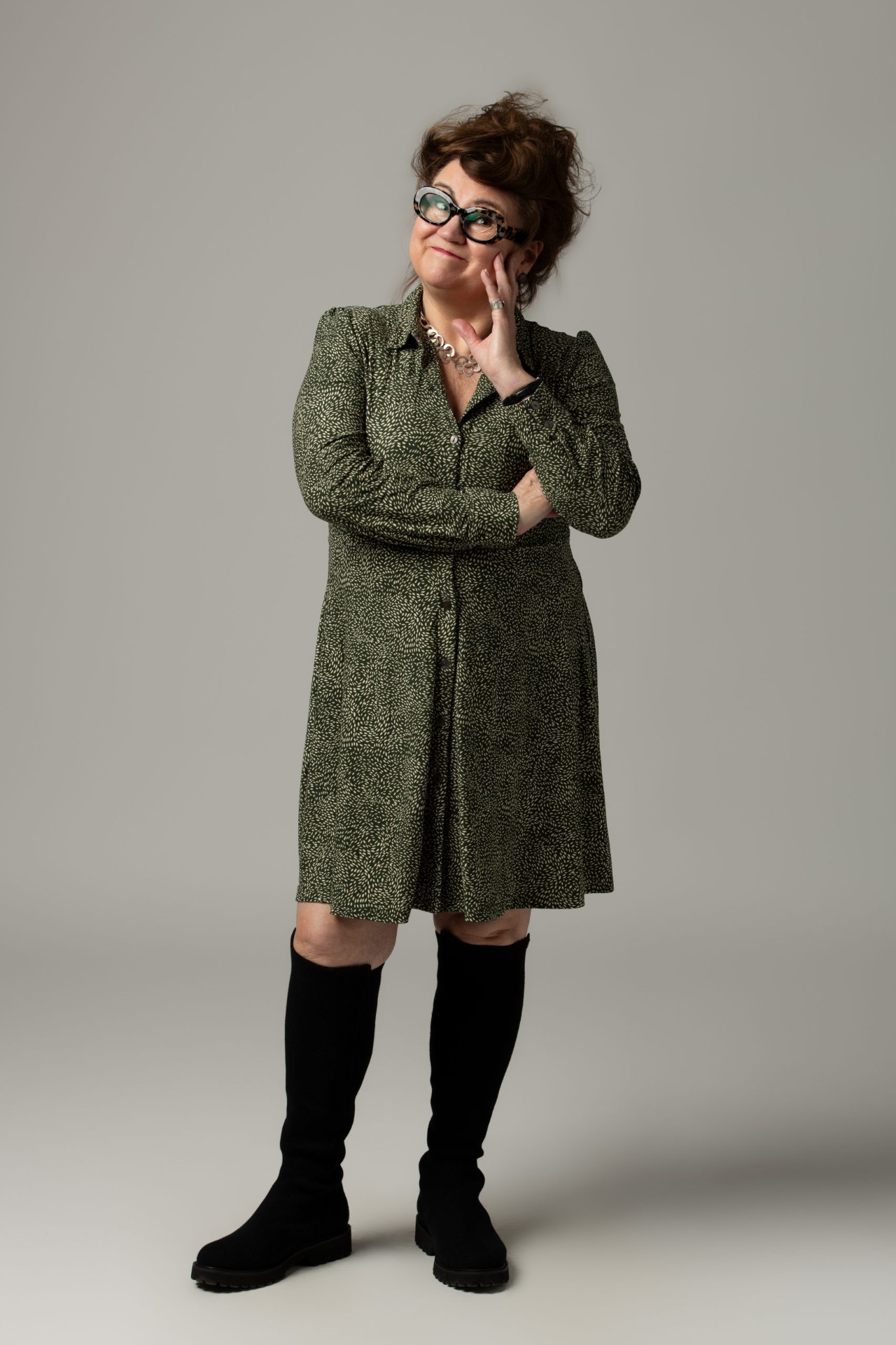 Tracey Burnett, full length portrait in a green dress